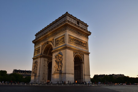 Paris, France. Moon and Arc de Triomphe at sunset. July 3, 2022.のeditorial素材