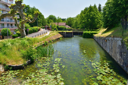 France, Montargis. Cityscape with a canal. May 29, 2023.のeditorial素材