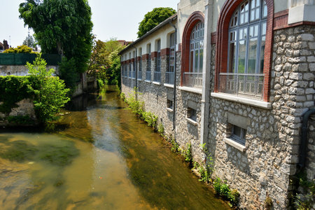 France, Montargis. Cityscape with a canal. May 29, 2023.のeditorial素材