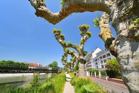 France, Montargis. Cityscape with a canal. May 29, 2023.のeditorial素材