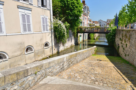 France, Montargis. Cityscape with a canal. May 29, 2023.のeditorial素材