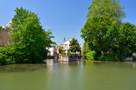 France, Montargis. Cityscape with a canal. May 29, 2023.のeditorial素材