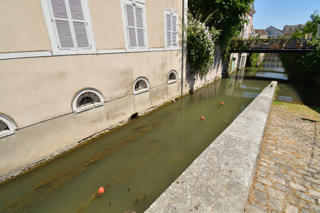 France, Montargis. Cityscape with a canal. May 29, 2023.のeditorial素材