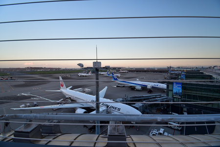 Tokyo Japan. Haneda Airport Terminal 3. View from the observation deck at dusk. August 17, 2023.のeditorial素材
