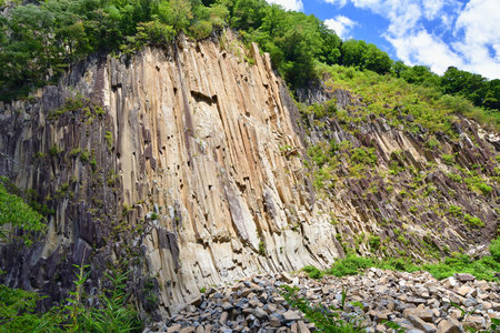 Shiroishi City, Miyagi Prefecture, Japan. Columnar joints, timber-like rocks, "ZAIMOKUIWA". August 10, 2023.の写真素材