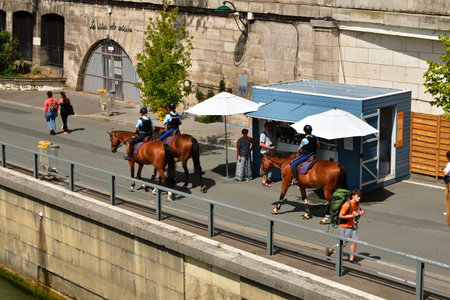 Paris, France. Mounted police patrolling along the Seine River. August 11, 2021.のeditorial素材