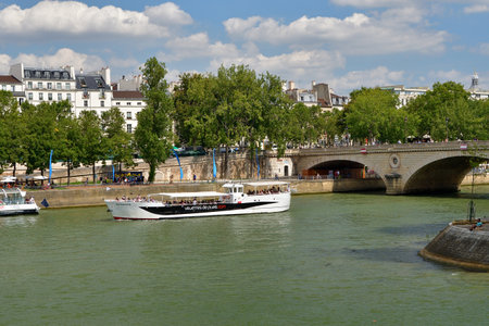 Paris, France. A boat sailing along the Seine River. August 11, 2021.のeditorial素材