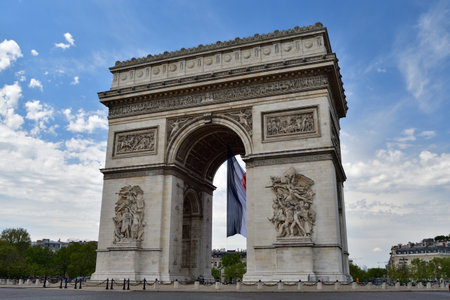 Paris, France. Arc de Triomphe with the French flag. May 9, 2021.