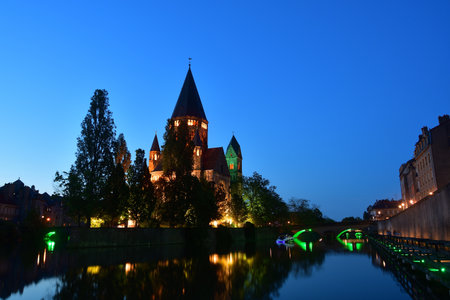 Metz, France. Night view of Temple Neuf (New Temple), a Protestant church. May 11, 2024.