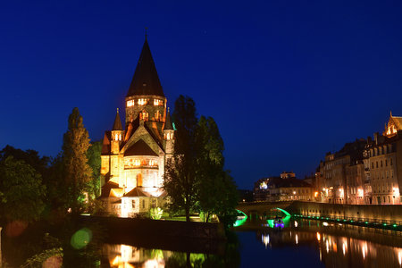 Metz, France. Night view of Temple Neuf (New Temple), a Protestant church. May 11, 2024.