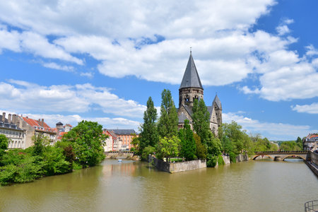 Metz, France. Temple Neuf (New Temple) as seen from the banks of the Moselle River. May 9, 2024.のeditorial素材