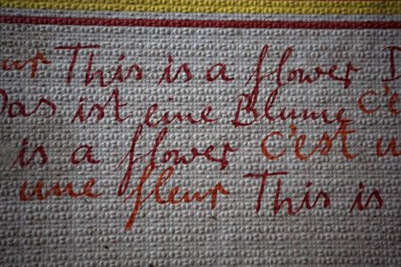 marche, italy - august 19, 2011:a sign on a tablecloth in an abandoned house in the mountains of central italy.のeditorial素材