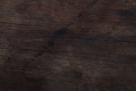 Rough textured wooden background. Vintage wood backdrop with grungy and aged texture. Old rustic timber, empty with copy space.の写真素材