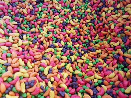 Seed mixture background. Pet food for birds. Small colorful dry pet food backgroundの写真素材