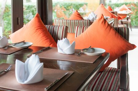 Dinner table preparing at the restaurantの写真素材