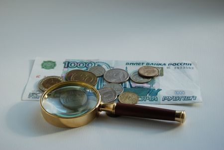 magnifying and moneyの写真素材