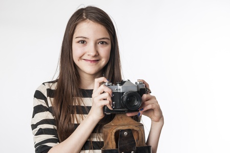 Little girl with old  russian photocamera