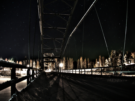 Bridge on a river in the night, nort of Swedenの写真素材