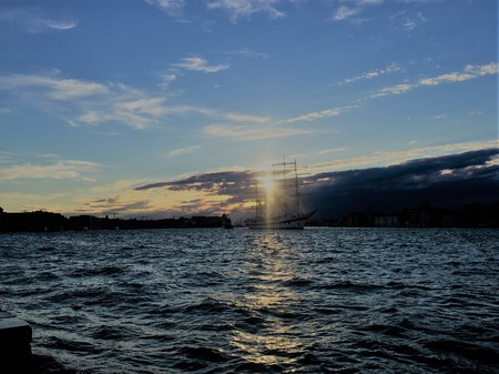 Sailing boat in Venice in the evening