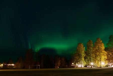 A wonderful night northern lights flying over the Nortrh of Swedenの写真素材