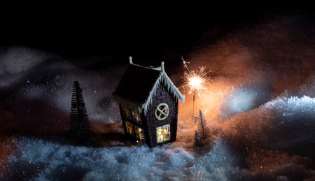 chocolate house on a snowの写真素材