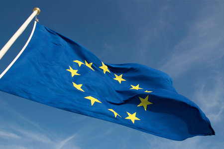 European Union flag on blue sky background