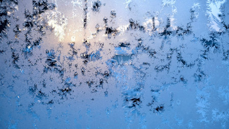 View of the window with frost-covered in Christmas time.の写真素材