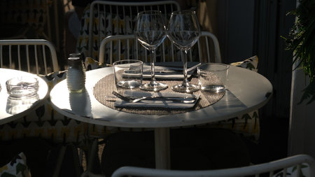 Luxury table setting in an outdoor restaurant. Selective focus.の写真素材