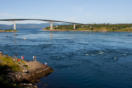 Aerial view of the Saltstraumen bridge and the world's strongest maelstrom, tidal current, in Bodo, Norwayの写真素材