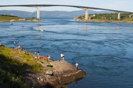 Aerial view of the Saltstraumen bridge and the worlds strongest maelstrom, tidal current, in Bodo, Norwayの写真素材