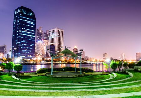 Skyline of Bangkok from stage arena in the parkの写真素材