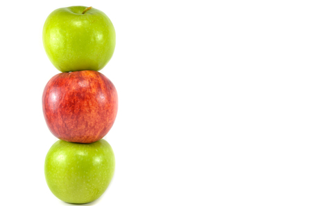 Red and green apples on white backgroundの写真素材