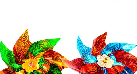 Children's colorful toy pinwheel on white background