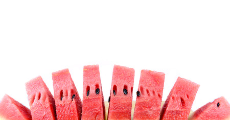 Cut slices of watermelon on white backgroundの写真素材