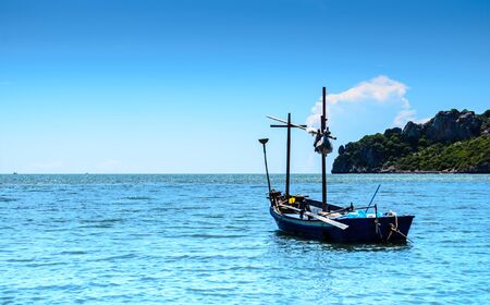 Lonely fishing boat waiting for the sailor