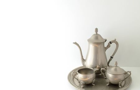 Three piece silver tea service on trayの写真素材