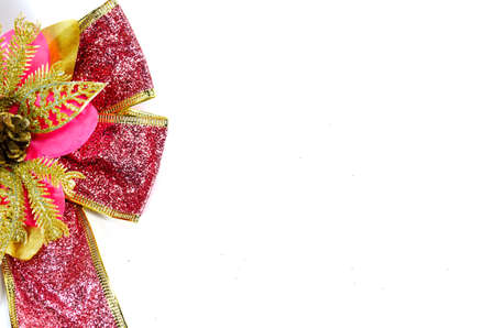 Christmas ribbon decoration on a white backgroundの写真素材