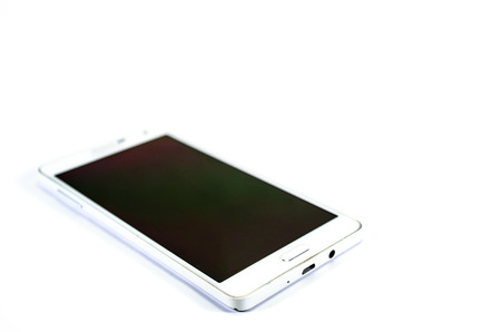 View of white handphone on white backgroundの写真素材