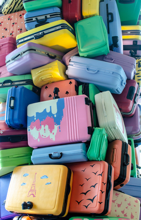Simulated luggage pile ready for airport carrierの写真素材