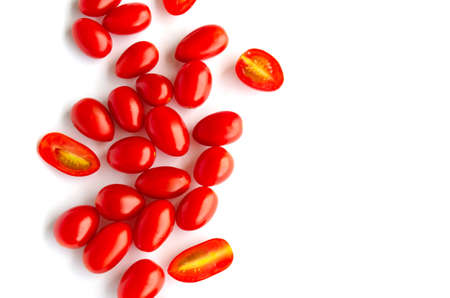 Close up of fresh cherry tomatoes on white backgroundの写真素材