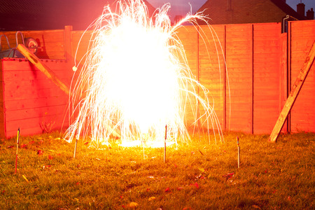 A firework fountain exploding in the nightの写真素材