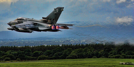 A fighter jet lifting off from the groundのeditorial素材