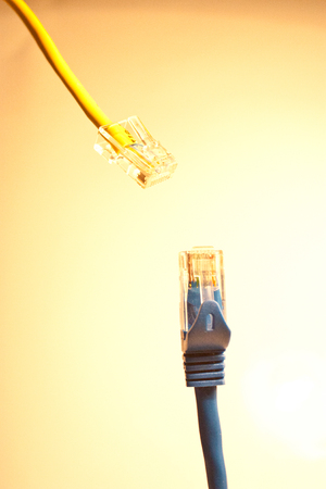 Two network cable connections coming together