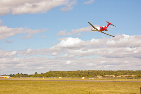 A beautiful red and white Boeing 727, Oil Spill Response, aircraft in the heart of England.のeditorial素材