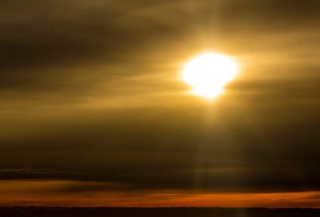 A beautiful aerial view of a golden sunset, almost creating a 'Tigers Eye' effect.