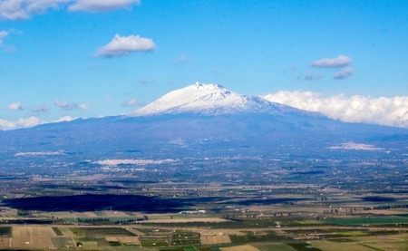 The World famous landmark, Mount Etna, with a snowy top.の写真素材