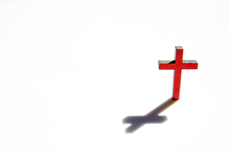 A single crucifix cross stands alone.の写真素材
