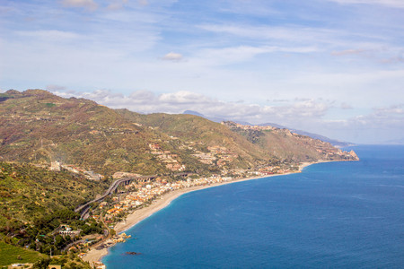 A view of the beautiful city of Taorimina city, in Sicily, Italy.の写真素材