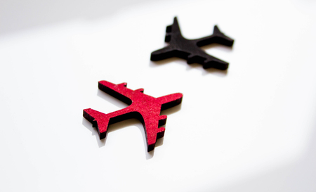 Black and red aircraft seen from above to signify anti collision or airspace traffic.