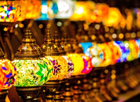 Stunning colourful glass lanterns lit up at a market stall in Camden Lock.